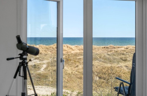Grena Strand House | With probably Grenås best location, this exciting house in the dunes awaits you.