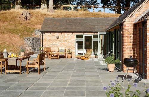Rosliston Cottage | Woodland Retreat is the ideal romantic getaway. Surrounded by woodland and several walking routes an