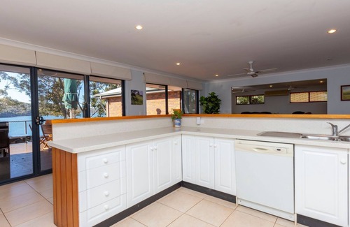 North Arm Cove House | Wybalena - set on a deep-water frontage in North Arm Cove