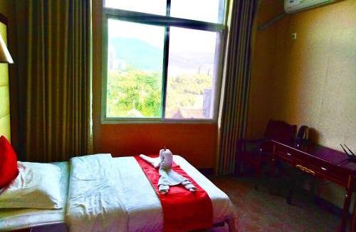 Jinghong Hotel | XiShuangBanNa International Aerial Garden South of Mekong River Business Hotel 傣江南商务酒店