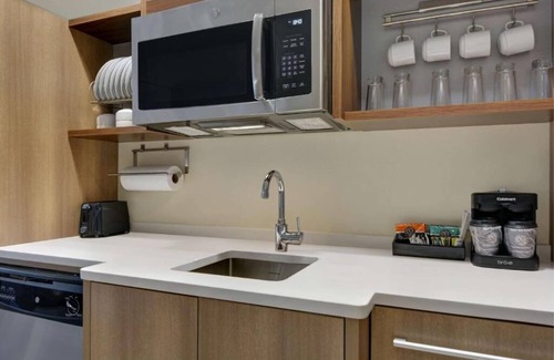 Upper Grand Lagoon Hotel | Your Home Away From Home! Onsite Pool, Kitchen, Free Breakfast, Parking!