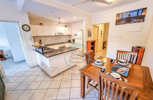 Cullen Bay Apartment | Zen City Balcony ~ Outdoor Dining ~ Mindal Markets