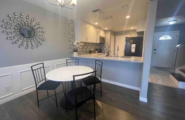 2 bed 2.5 bath townhouse with private parking.