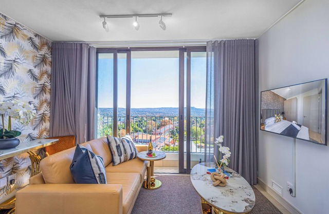 2 Bedroom apartment with an amazing view, Wifi, AC & a restauarant onsite.