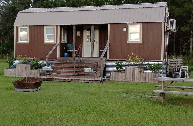 2 Tiny Homes on 6 acres with our horse. Rolling hills, pond, sunsets, fire pit.