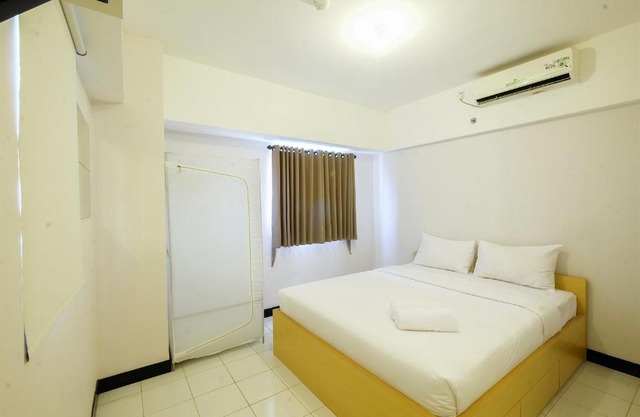 2BR Pool View @ The Wave Apartment near Epicentrum Kuningan By Travelio