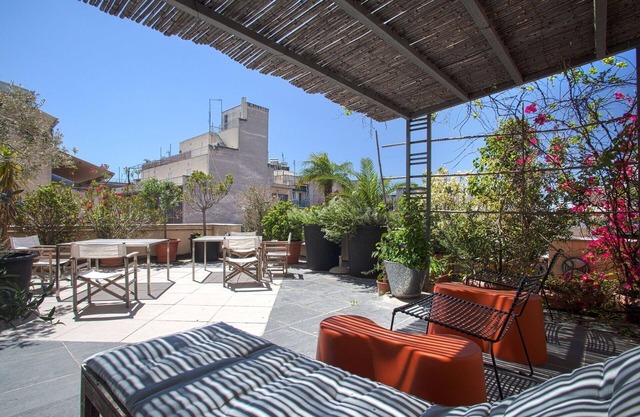 4 apts over 2 levels. Balconies & roof top terrace. Next to Plaka! EP1234