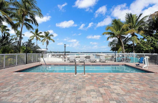 4 Tropical Waterfront Stay w/Private Beach, Pool, Workstation & Kayak