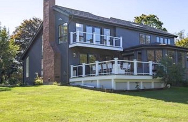 5 Bedrooms ~ Steps from a Private Sandy Beach and Beautiful Vineyard Views.