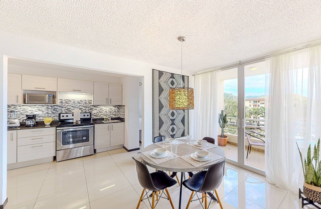 6th-floor apt near beach with pool views, outdoor pool, balcony, streaming, W/D