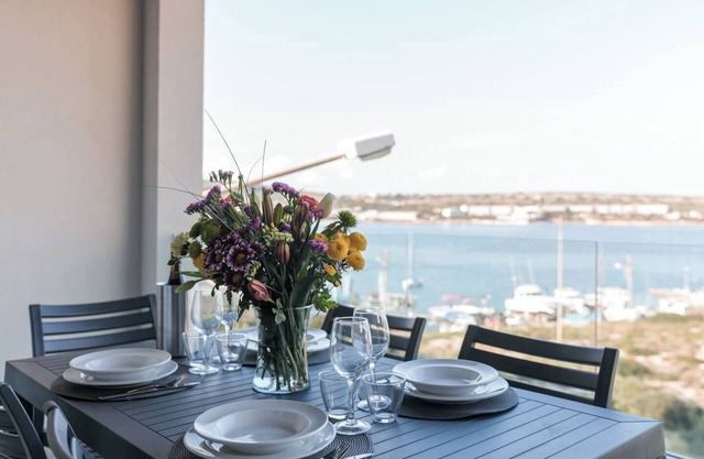 🌴 9ten11 Mellieha Bay – modern 3BR seafront apartment just 50m from the beach 🌅 Perfect for families, couples & business stays, with lift access 🐚☀️.
