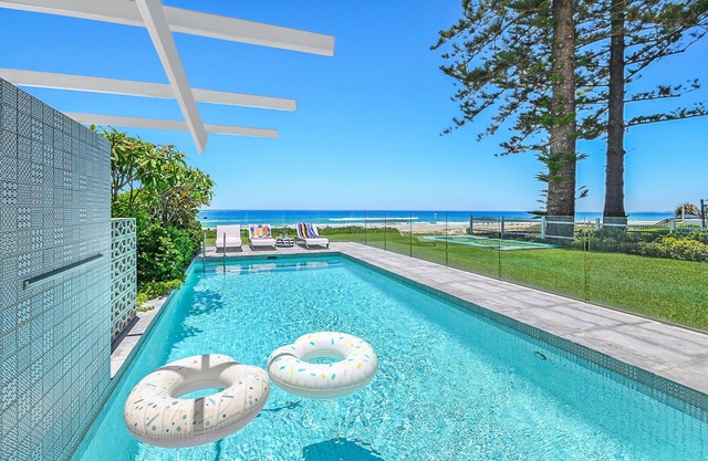 Absolute Beachfront Luxury Home with Heated Pool