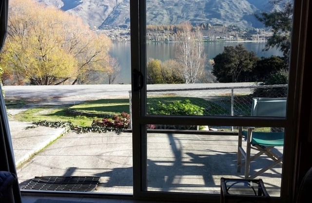 Absolute Lakefront quirky sixties Unit, spectacular lake and mountain views.