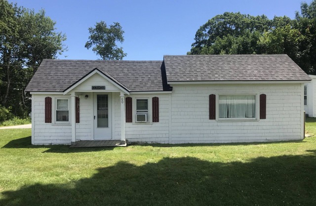 Adorable cottage with million dollar view and short walk to stunning beach.