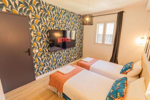 AfroBoHome, Expérience Atypique, clim, 2 à 6 personnes, Proche centre Nîmes, Garage clos