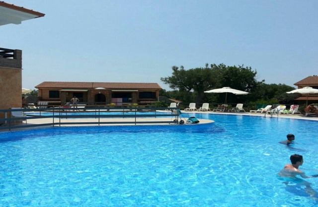 Apartment in park with swimming pool