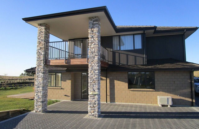 Apartment with lake, mountain & rural views.