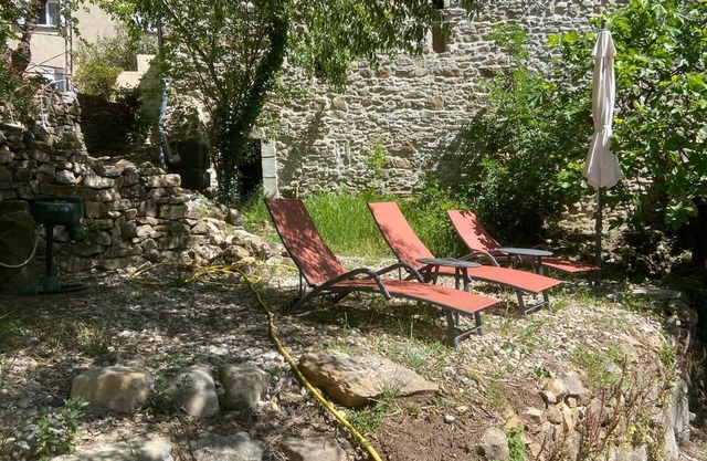 Atypical Cottage: Stone House Hosting an Art Gallery Cottage, Large Terrace