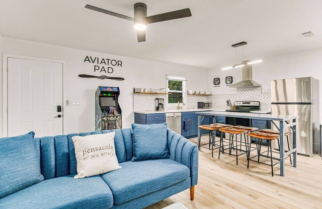 Aviator Pad: Walk Downtown from this Coastal Bungalow w/Pet-Friendly Backyard