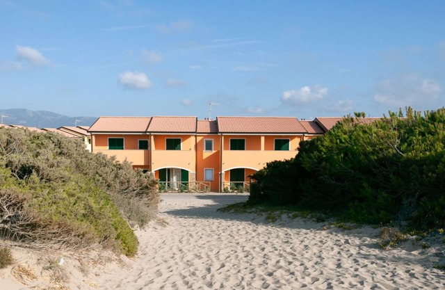 Baia delle Mimose village, Anfiteatro degli Oleandri area, facing the sea