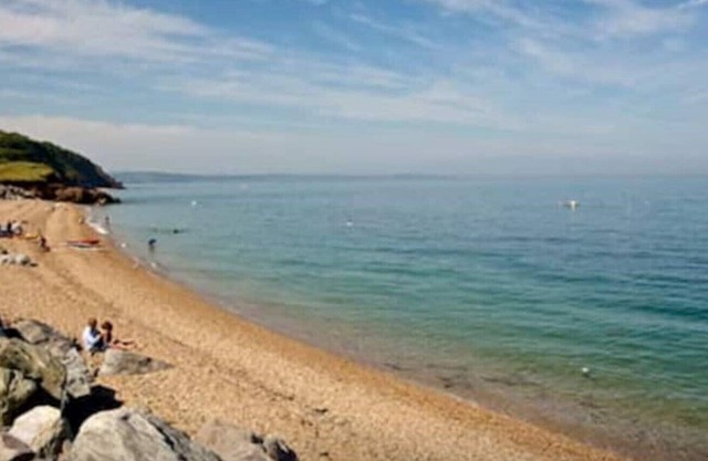 Beach Front Coastal Retreat with Sea Views