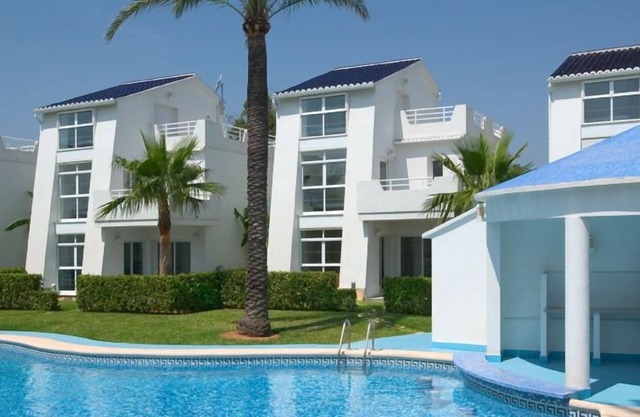 Beach front villa in a family friendly small community with pool