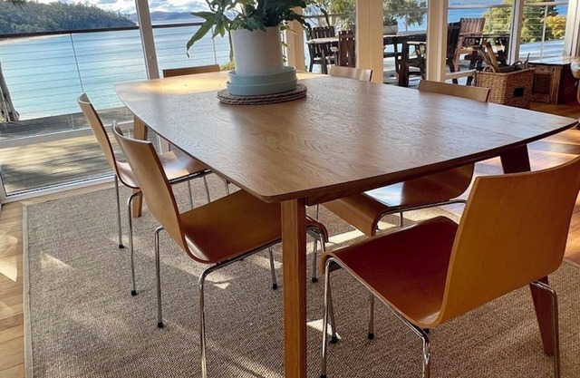 Beach house with sauna. Stunning views, cosy renovated mid-century gem