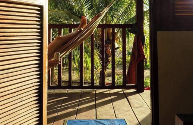 Beachfront bungalow: sea, garden and mountain views