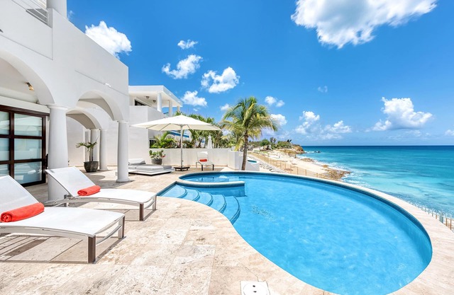 Beachfront villa with concierge service, housekeeping, airport pickup, pool