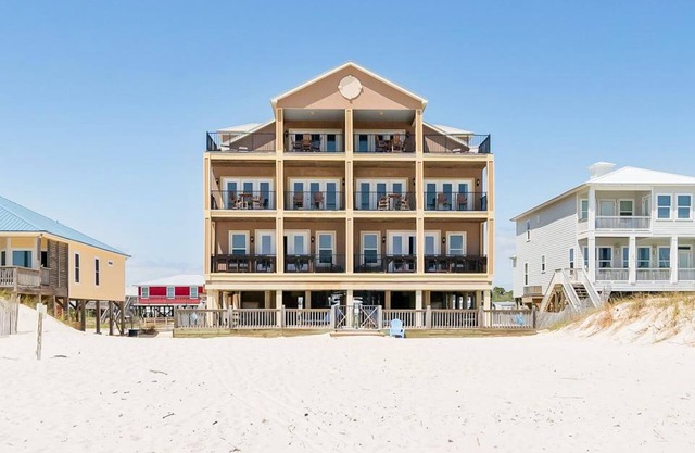 Beachfront wedding/event venue duplex with private pools, elevators, and suites