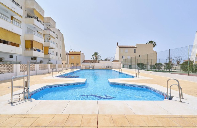 Beachside Bliss Apartment with Shared Pool, Wi-Fi, and Air Conditioning