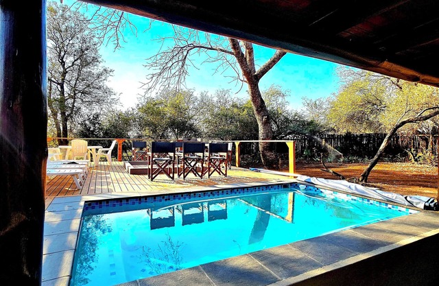 Beautiful 4-bedroom family house with AC on the river in Marloth Park.