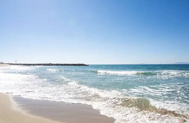 Beautiful gated beach side condo 5 min walk to sand