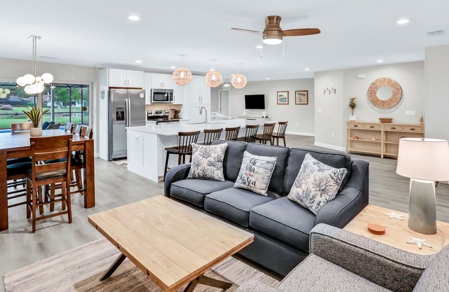 Beautiful lake-view home with screened lanai, private pool & W/D