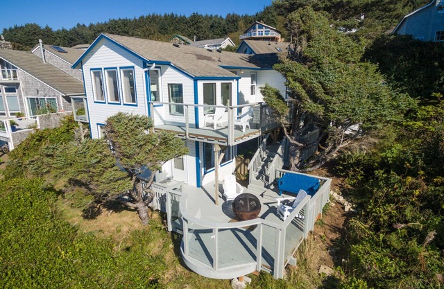 Beautiful oceanfront home with sweeping views, multiple decks, and pet friendly