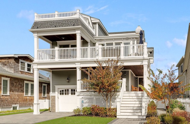 Beautiful three story home with a pool in terrific location to town, shops , great restaurants and the beach !