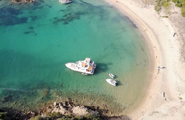 Boat at the quay in the heart of the city, old port Ajaccio - atypical luxury