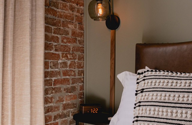 Boutique 1 BR King Guest Room in historic Jacksonville, OR. Features a plush King bed, Nespresso machine, and charming Inn details. Perfect for a comfortable, walkable downtown escape.