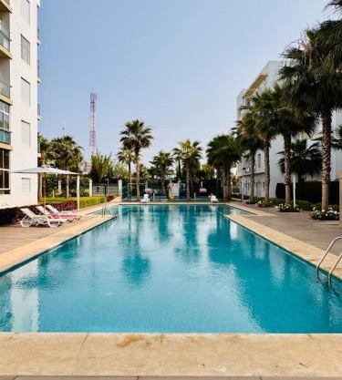 Bright Apt with Balcony, WiFi, Parking and Pool Resort