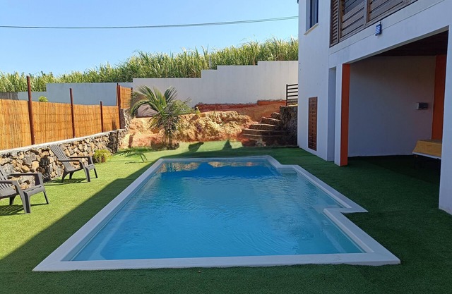 Bright Creole house with peaceful pool & view of the wild coastline