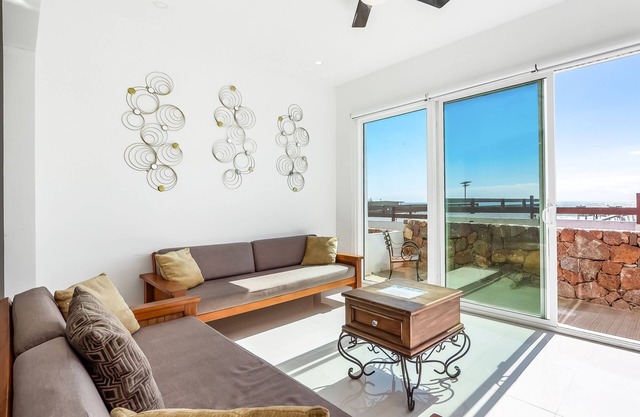 Bright dog-friendly home with heated pool, hot tub, streaming, & ocean views