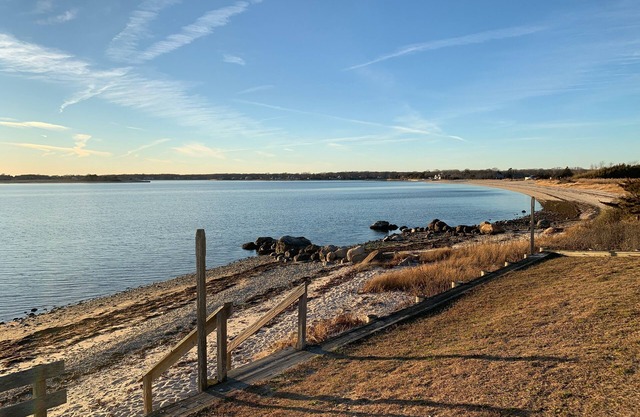 Bright, open waterfront house with gorgeous sunsets and private beach