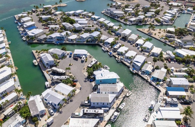 Canal front lot only. No house or RV. You need to bring your RV.