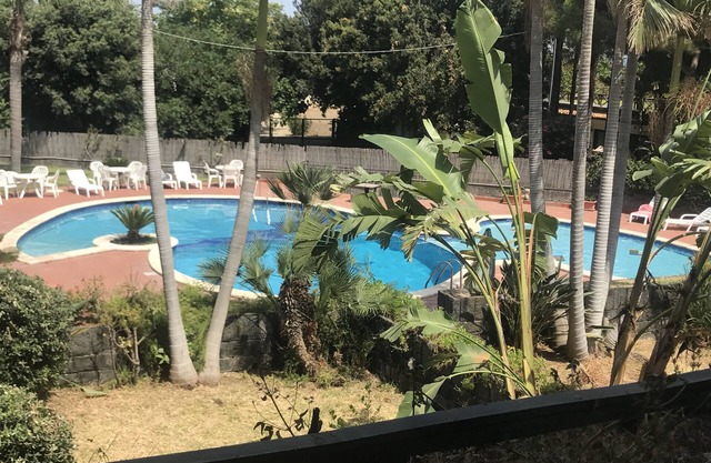 Capomulini villa with private garden, descent to the sea and seasonal swimming pool.