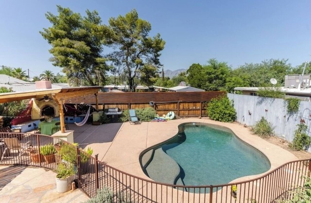 Central house located by university of Arizona with pool and hot tub