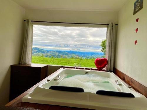 Chalé Mirante da Colina1 com hidro privativa e café da manhã