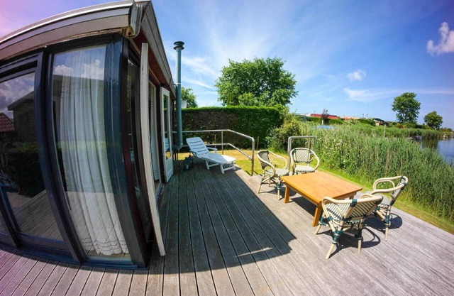 Chalet in the harbour with fishing jetty infrared sauna