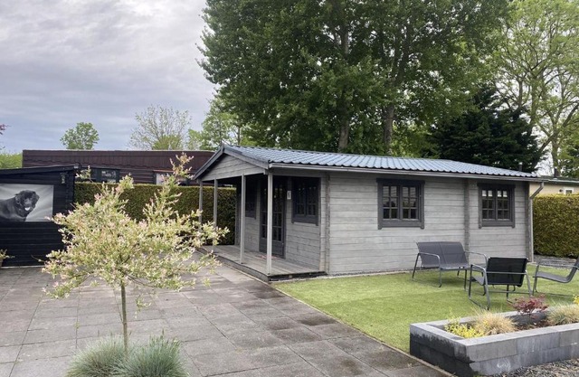 Chalet with a spacious garden, in Friesland