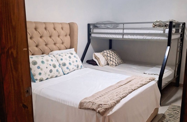 Charming 2-bedroom house with AC 10 mins walking away from the beach in Tela