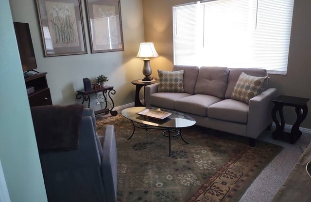 Charming 3 bed/2 bath condo with Central AC/Heat & 2 car garage.